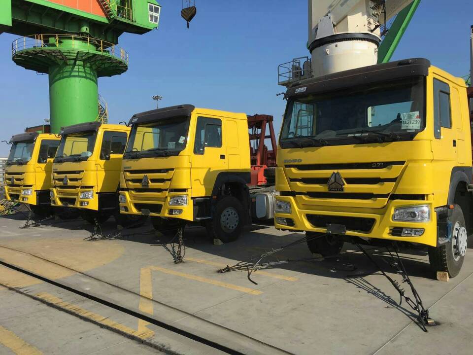 9 units 6X4 10 wheeler Howo tractor truck loaded on the ship for the South Sudan customer 9 units 6X4 10 wheeler Howo tractor truck loaded on the ship for the South Sudan customer